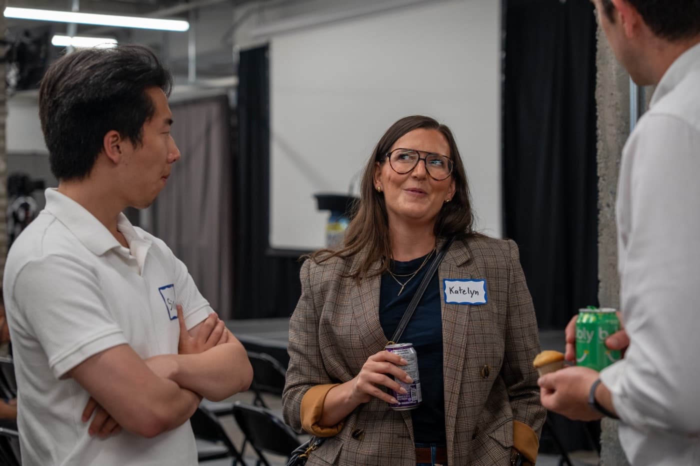 Open networking and conversations after AI startup pitches at a Spark night